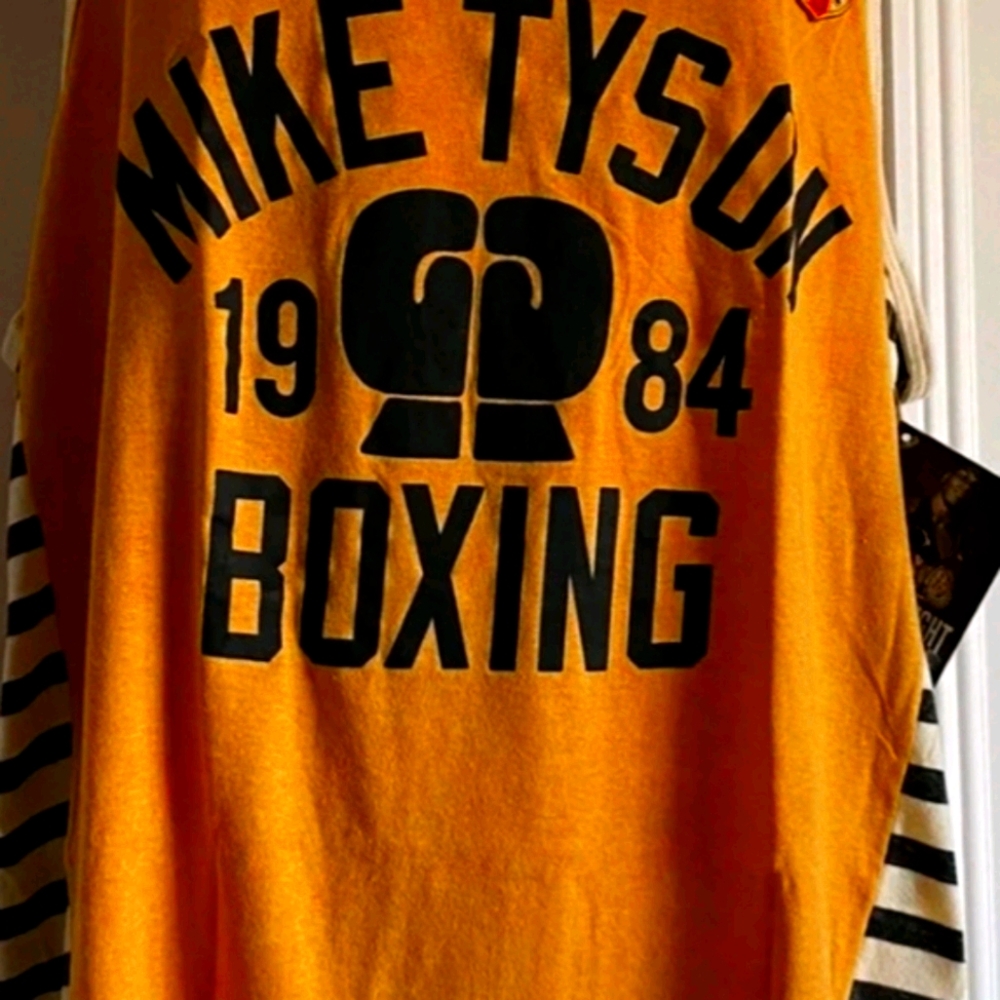 In search of roots of fight tank tops.